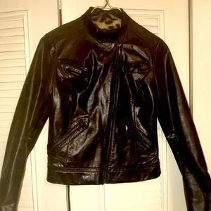 Chocolate brown distressed leather jacket.